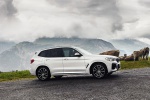 2020 BMW X3 xDrive30e PHEV AWD in Alpine White - Driving Front Right Three-quarter View
